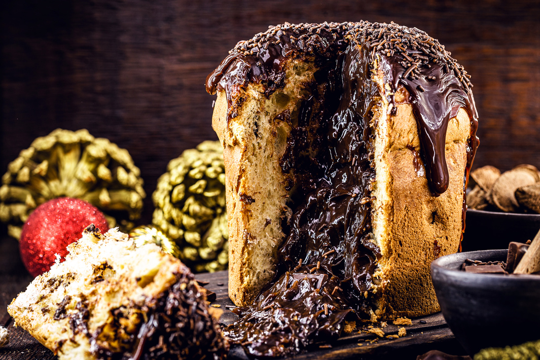 sliced "u200b"u200bchocolate panettone with dripping chocolate filling, typical Christmas dessert in Brazil and Italy